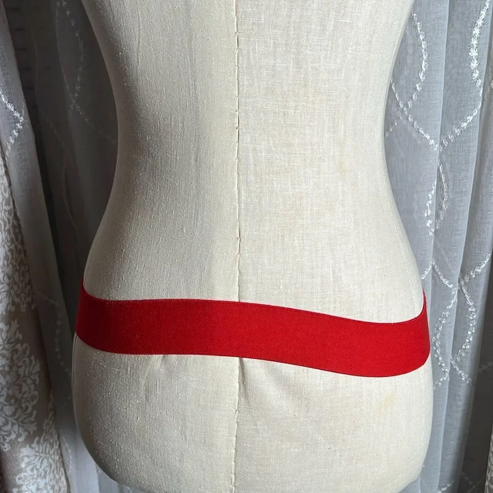 VINTAGE Anne Klein red stretch belt with gold buckle.